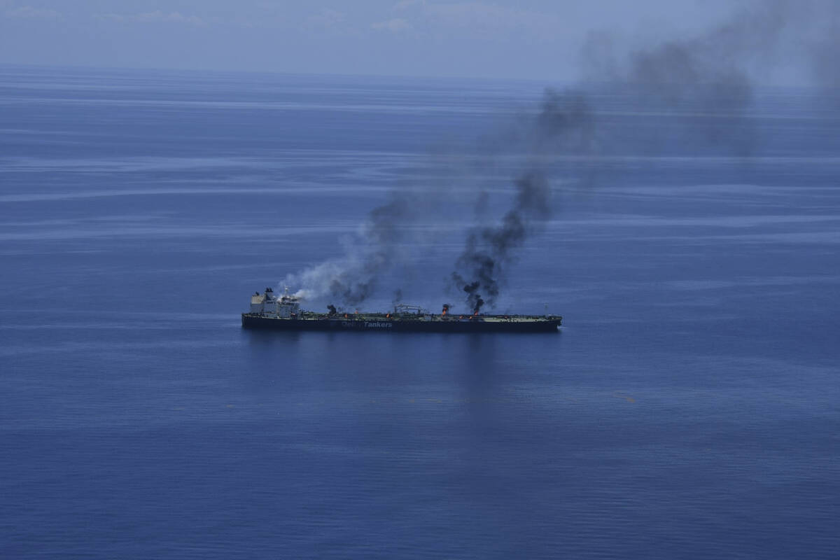 This photo released by the European Union's Operation Aspides shows fires burning aboard the oi ...