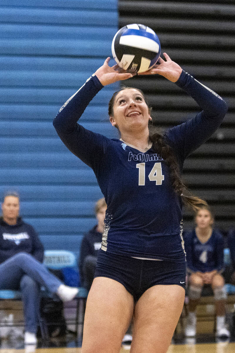 Foothill junior Siena Novak (14) sets the ball during the volleyball match against Bishop Gorma ...