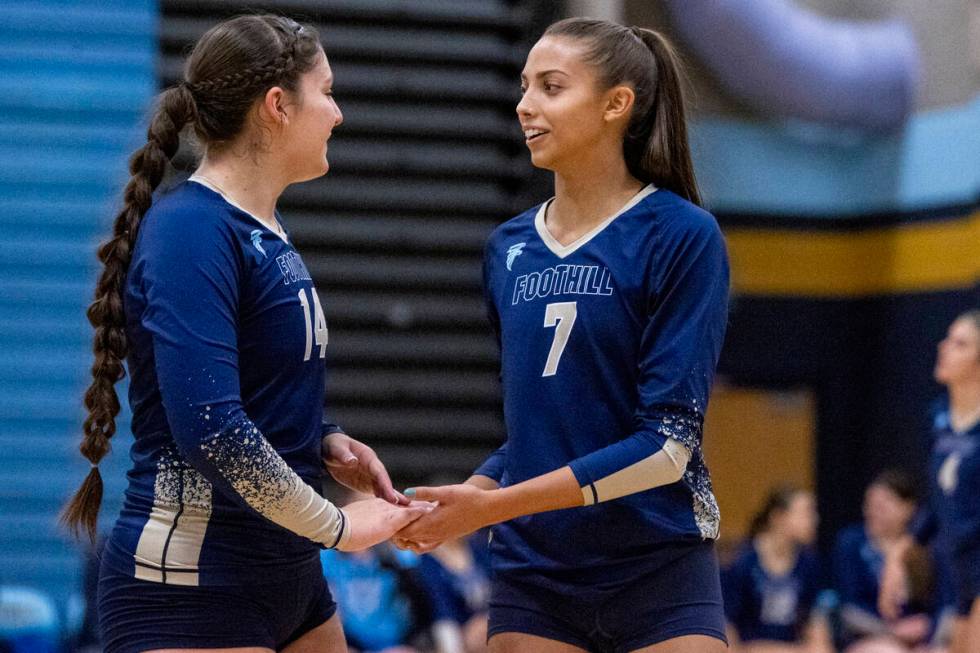 Foothill junior Siena Novak (14) and senior Jaydee Johnson (7) celebrate a point during the vol ...