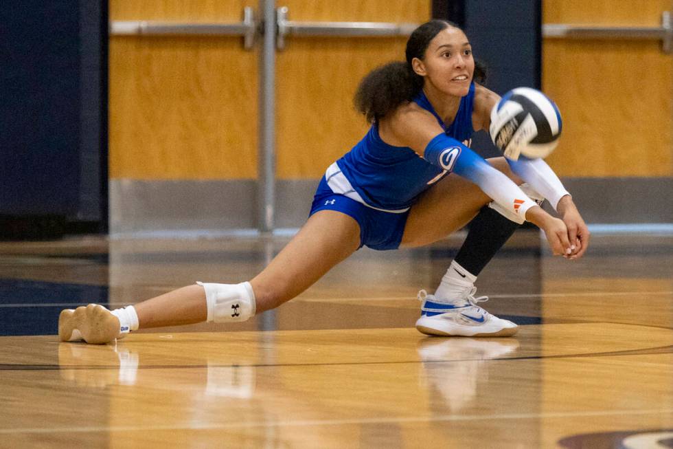 Bishop Gorman junior Ayanna Watson (8) receives the ball during the volleyball match against Fo ...