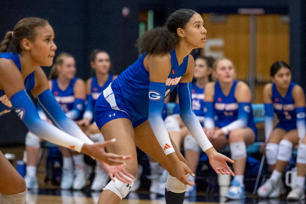 Bishop Gorman junior Ayanna Watson (8) prepares for the serve during the volleyball match again ...