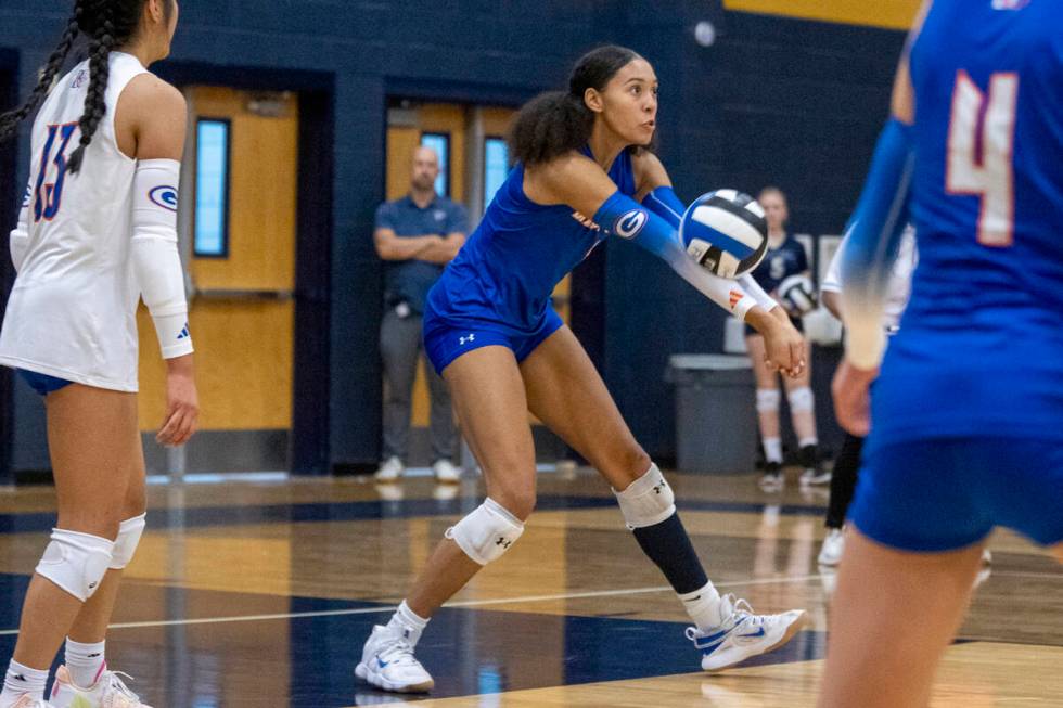 Bishop Gorman junior Ayanna Watson (8) receives the ball during the volleyball match against Fo ...