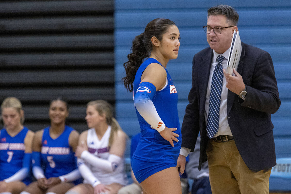 Bishop Gorman junior Trinity Thompson (9) talks with Head Coach Gregg Nunley during the volleyb ...