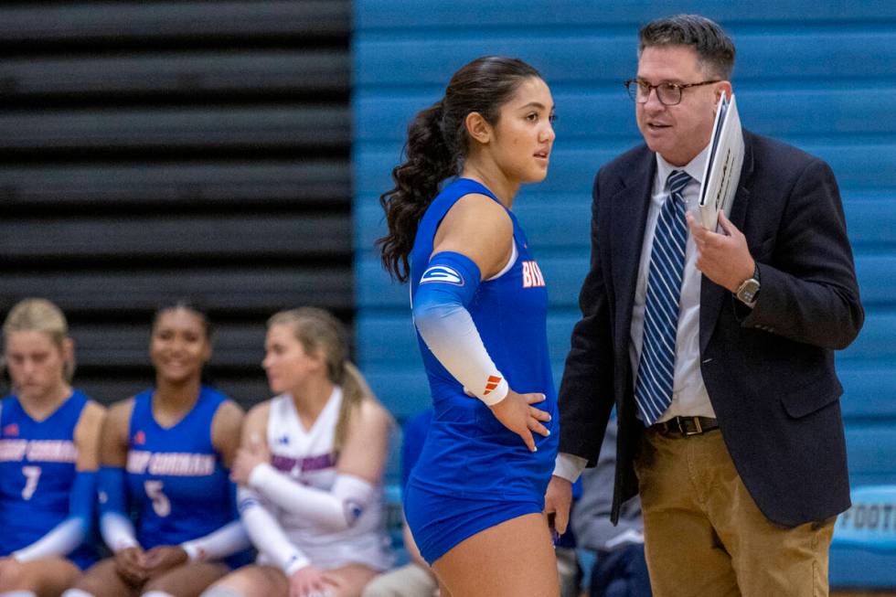 Bishop Gorman junior Trinity Thompson (9) talks with Head Coach Gregg Nunley during the volleyb ...