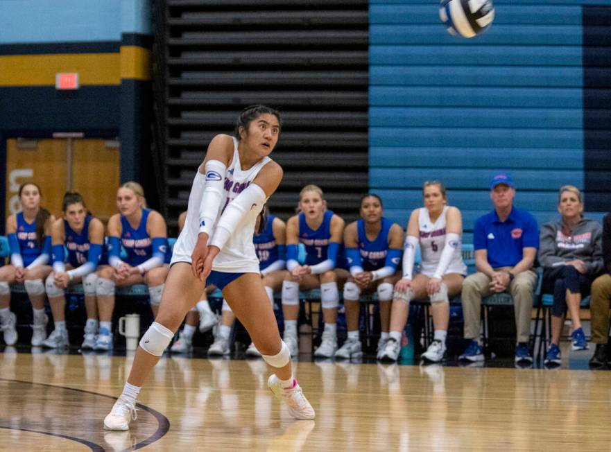 Bishop Gorman sophomore Chloe Lopez (13) receives the ball during the volleyball match against ...