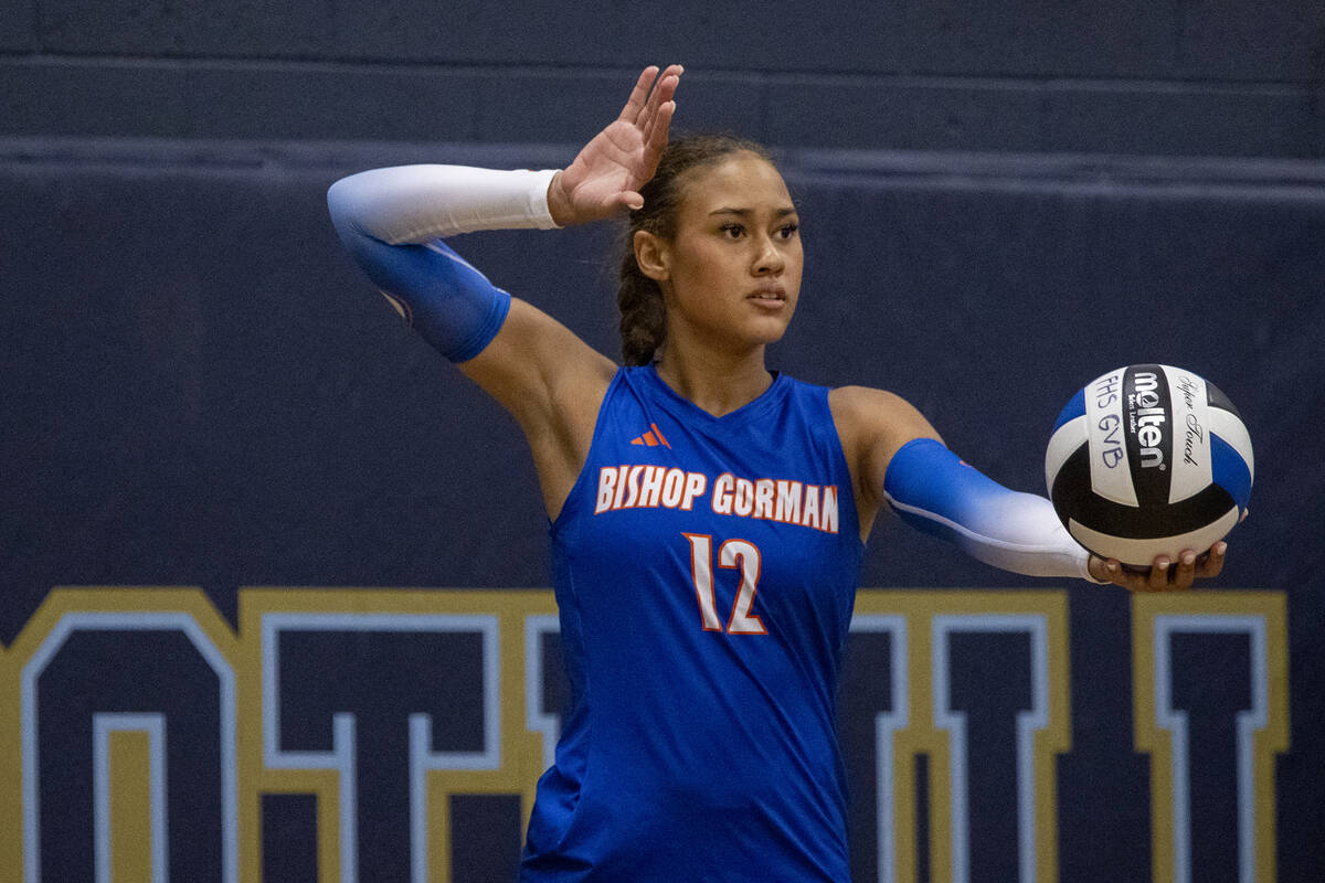 Bishop Gorman junior Brooklynn Williams (12) prepares to serve the ball during the volleyball m ...