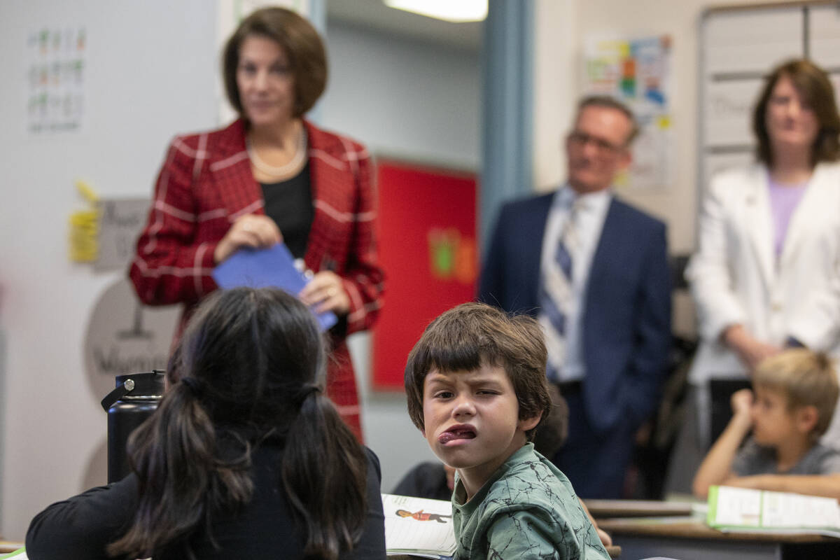 A student in Kimberly Pacheco’s classroom makes faces at the camera as U.S. Sen. Catheri ...