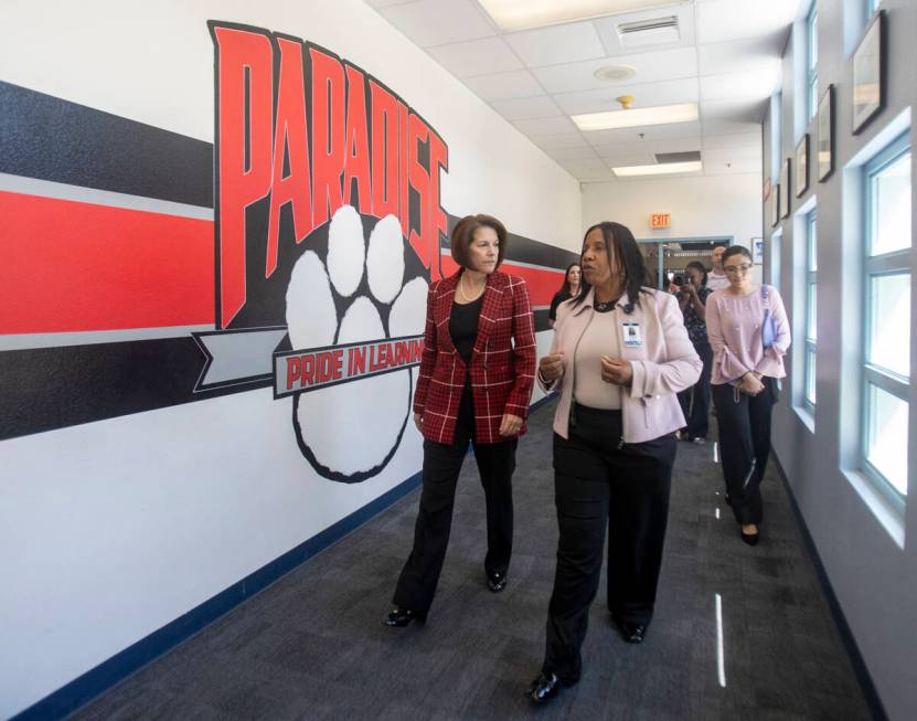 U.S. Sen. Catherine Cortez Masto, D-Nev., left, is taken on a walk-through by Principal Pamela ...