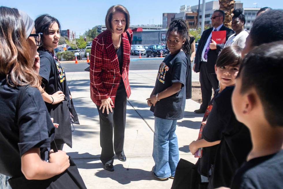 U.S. Sen. Catherine Cortez Masto, D-Nev., is greeted by student council members during a tour a ...