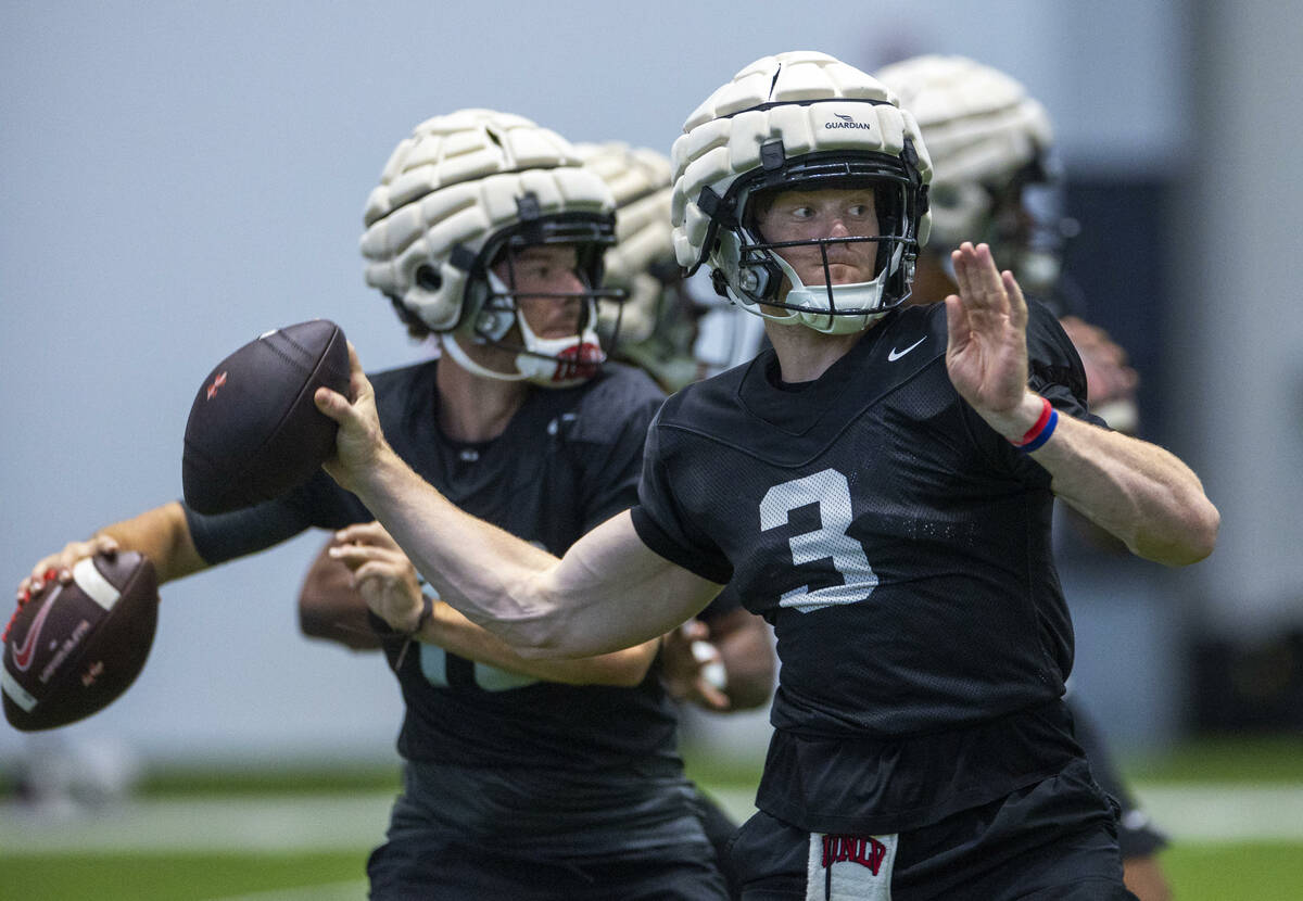 UNLV quarterback Matthew Sluka (3) eyes a receiver during football practice at the Intermountai ...