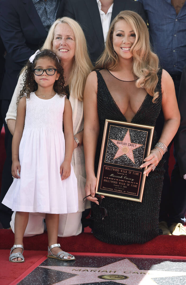 FILE - Mariah Carey appears with her mother Patricia and daughter Monroe during a ceremony hono ...