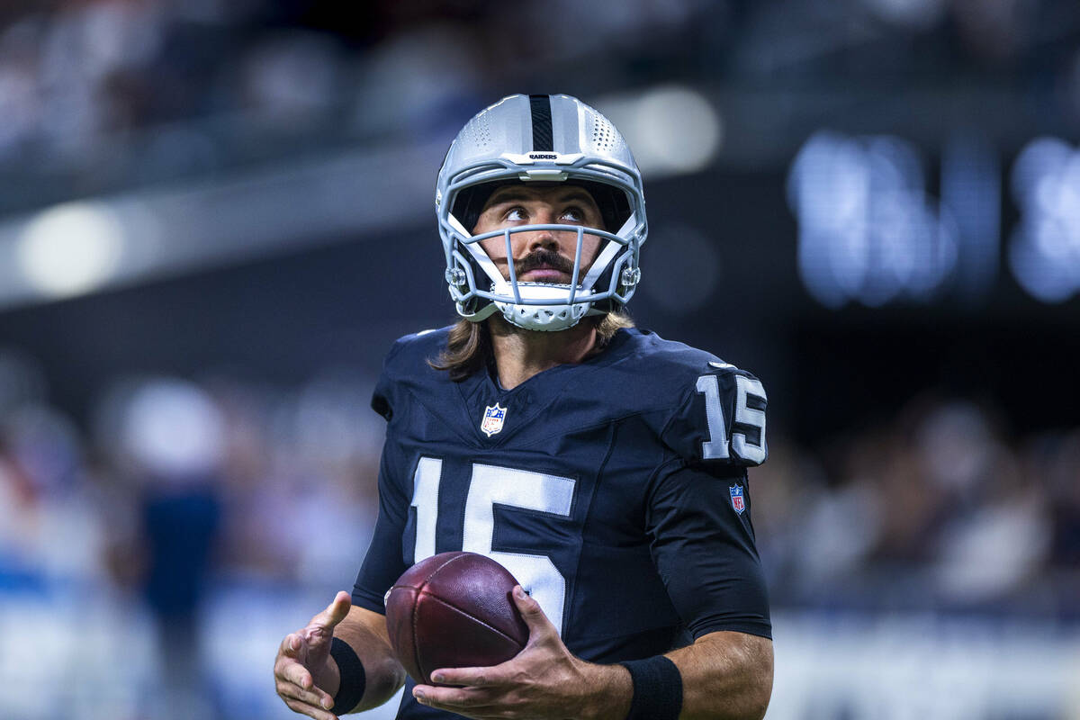 Raiders quarterback Gardner Minshew (15) looks to the stands as they face the Dallas Cowboys fo ...