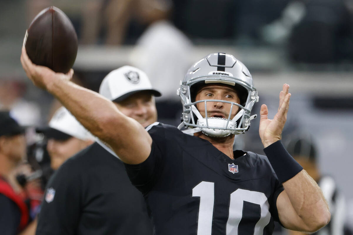 Raiders quarterback Nathan Peterman (10) throws the ball as he warms up to face San Francisco 4 ...