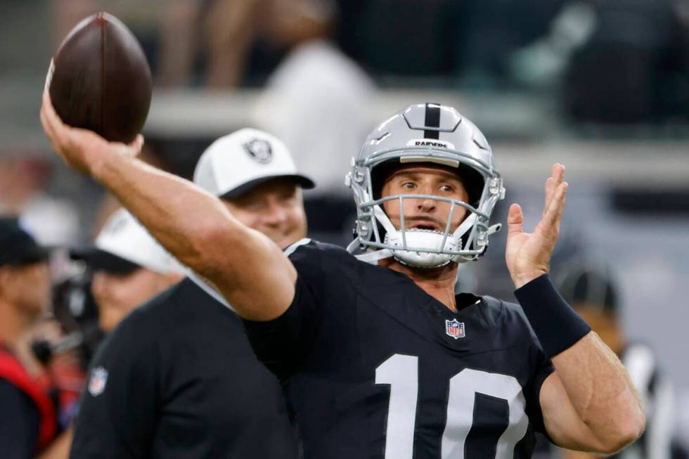 Raiders quarterback Nathan Peterman (10) throws the ball as he warms up to face San Francisco 4 ...