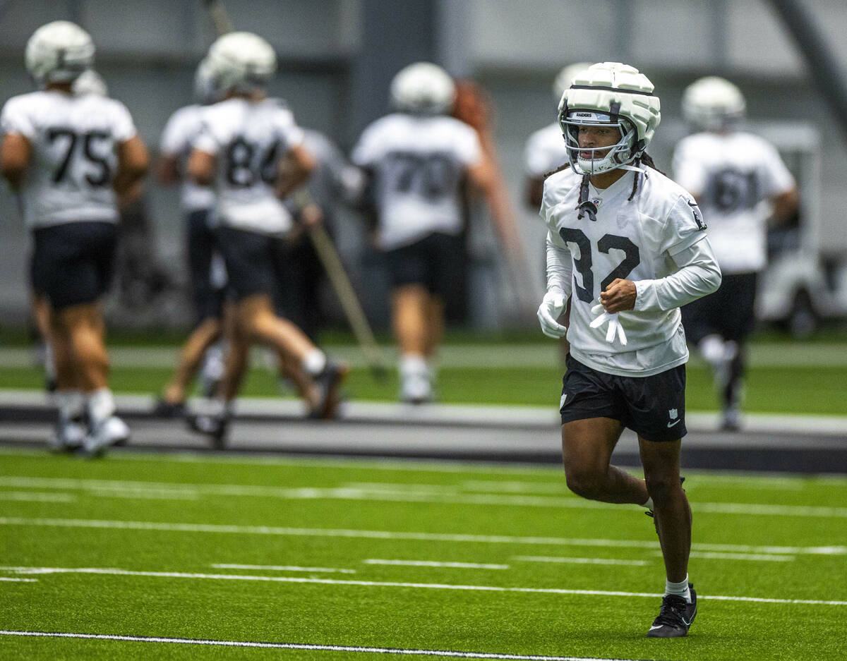 Raiders wide receiver Tyreik McAllister (32) runs to a drill during practice at the Intermounta ...