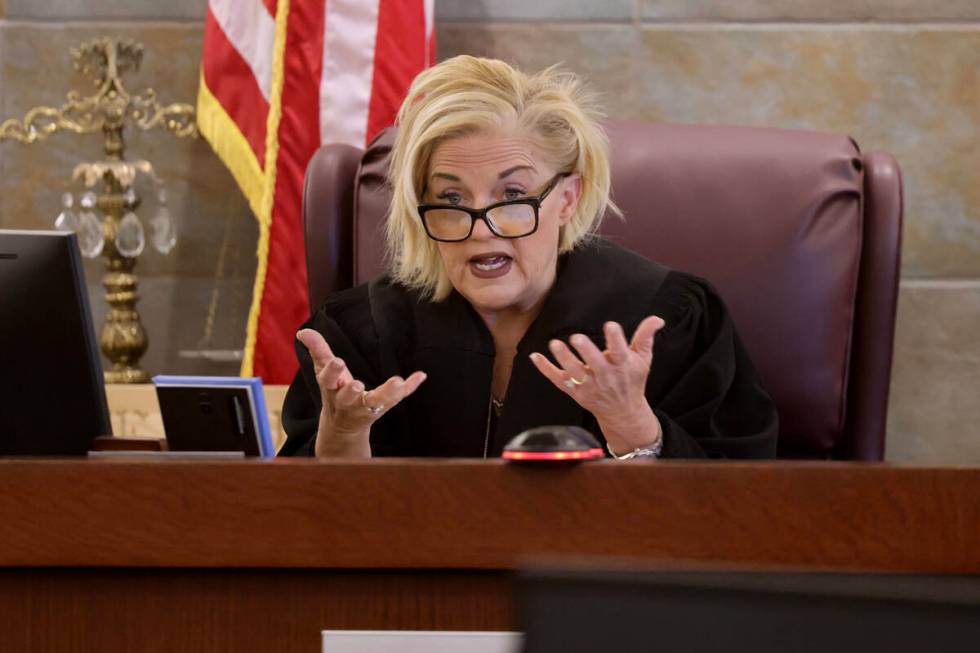 District Judge Michelle Leavitt addresses attorneys at a hearing regarding juror questions duri ...