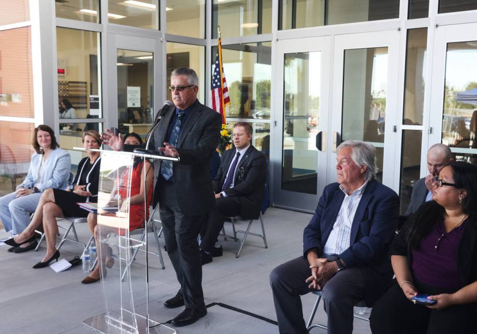 Dennis Kubala, former principal, speaks to guests at a ribbon cutting event at Ruby S. Thomas E ...