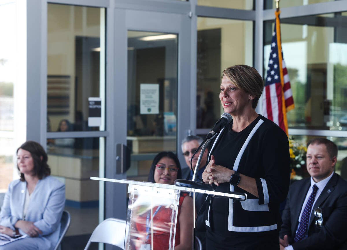 Lisa Satory, Clark County School District school board trustee, speaks to guests at a ribbon cu ...