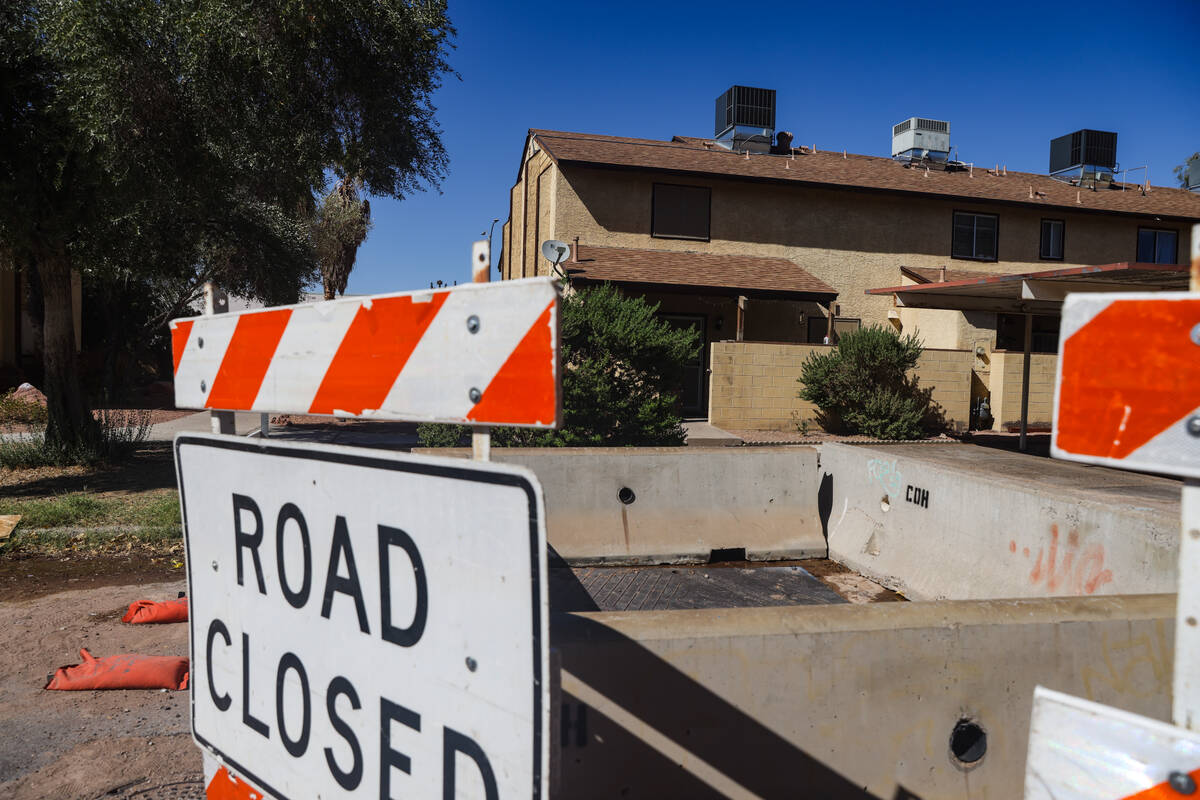 A blocked off sink hole in the Somerset Park neighborhood in Henderson, Tuesday, Aug. 27, 2024. ...