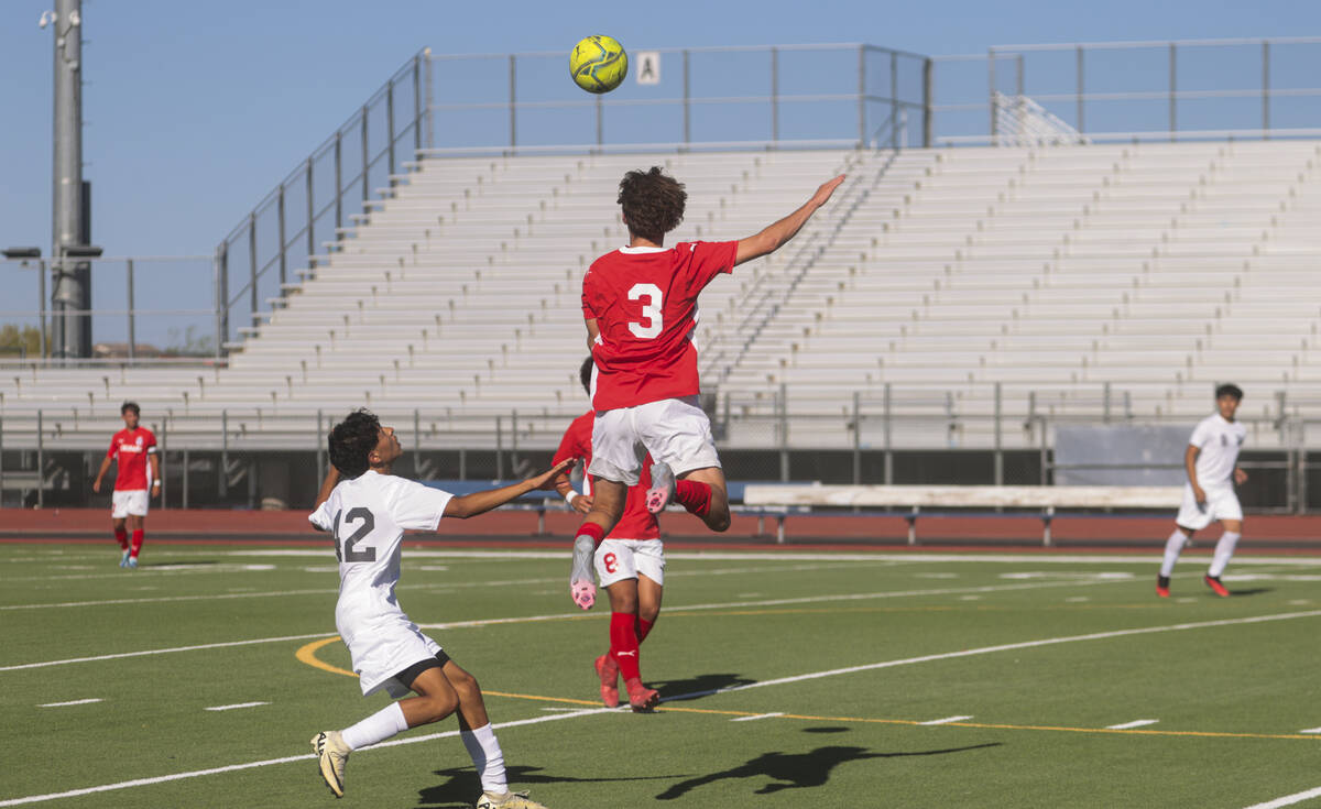 Coronado's Grayson Elisaldez (3) heads the ball during a soccer game against Cimarron-Memorial ...