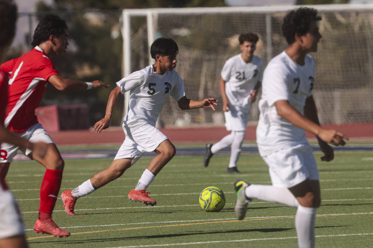 Cimarron-Memorial's Philip Obradovic (5) moves the ball during a soccer game at Coronado High S ...