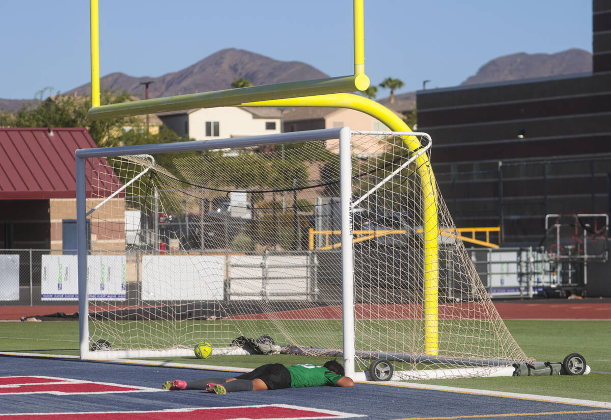 Cimarron-Memorial's goalkeeper Jose Martin (16) lies on the ground after giving up a goal durin ...