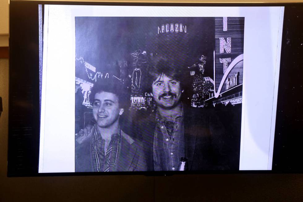 A family photo of Jeff German, right, and his brother Jay German, is shown in court during the ...