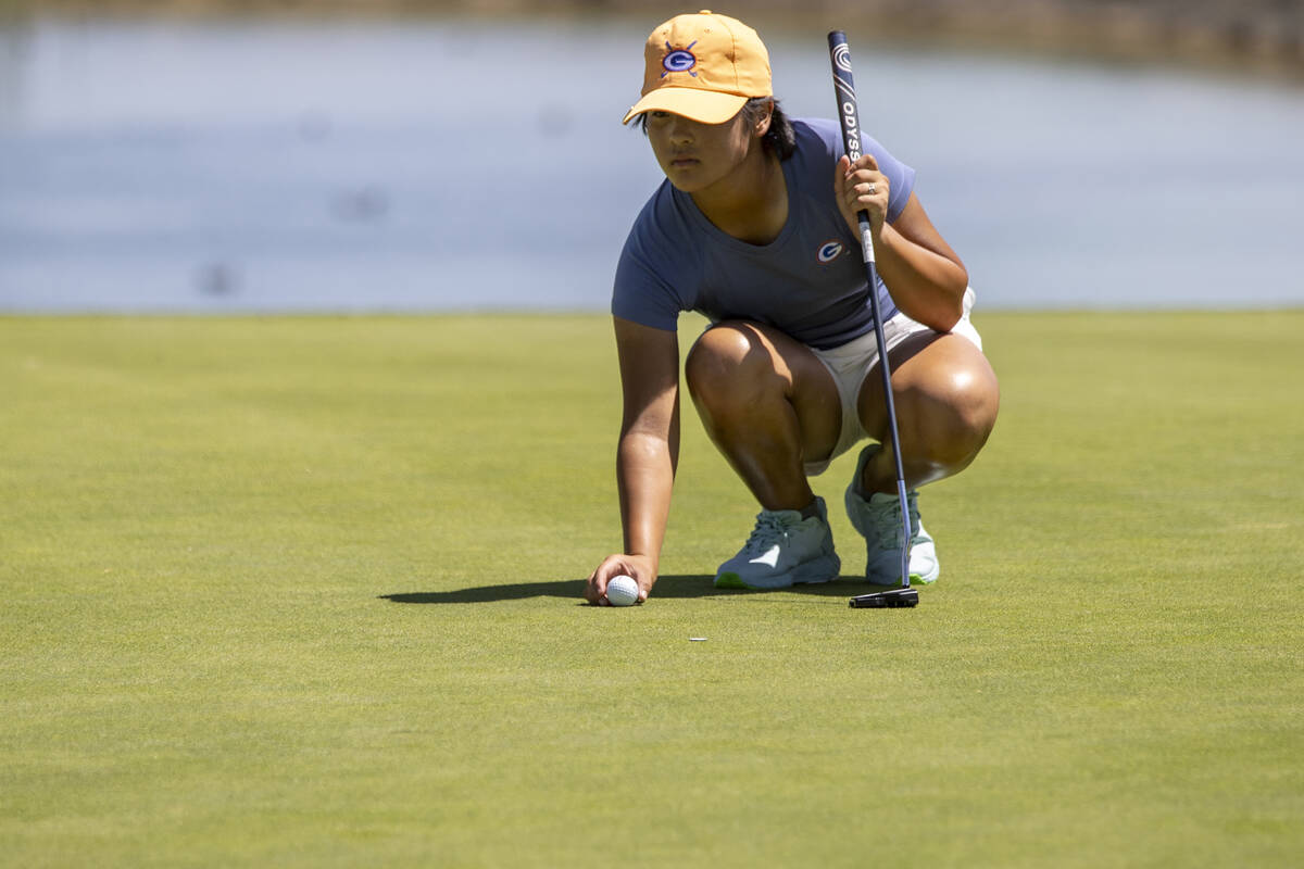 Bishop Gorman’s Amelia Chen places her ball during the Class 5A Mountain League girls go ...