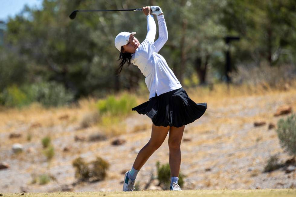 Clark’s Cydney Ha drives her ball down the fairway during the Class 5A Mountain League g ...