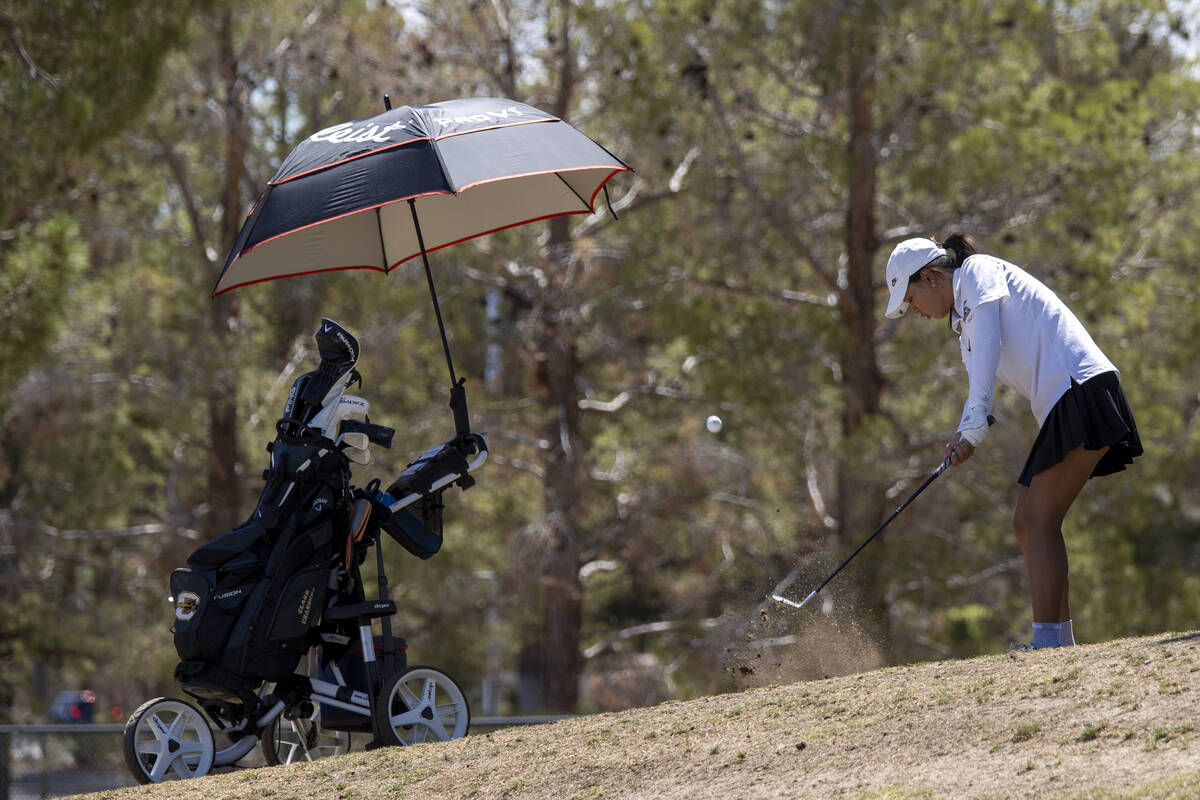 Clark’s Cydney Ha competes during the Class 5A Mountain League girls golf match at Angel ...