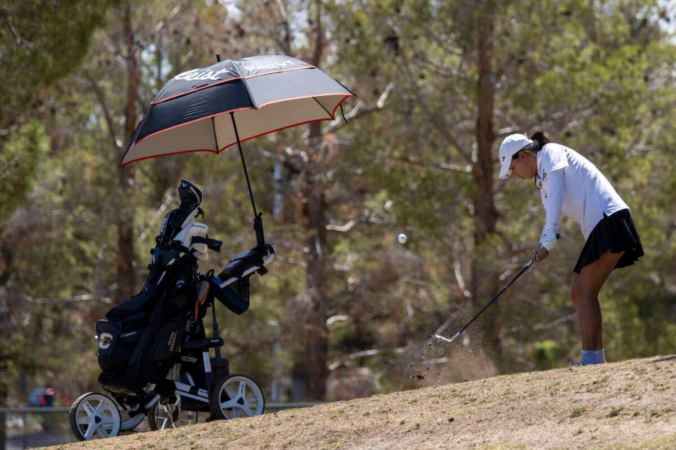 Clark’s Cydney Ha competes during the Class 5A Mountain League girls golf match at Angel ...