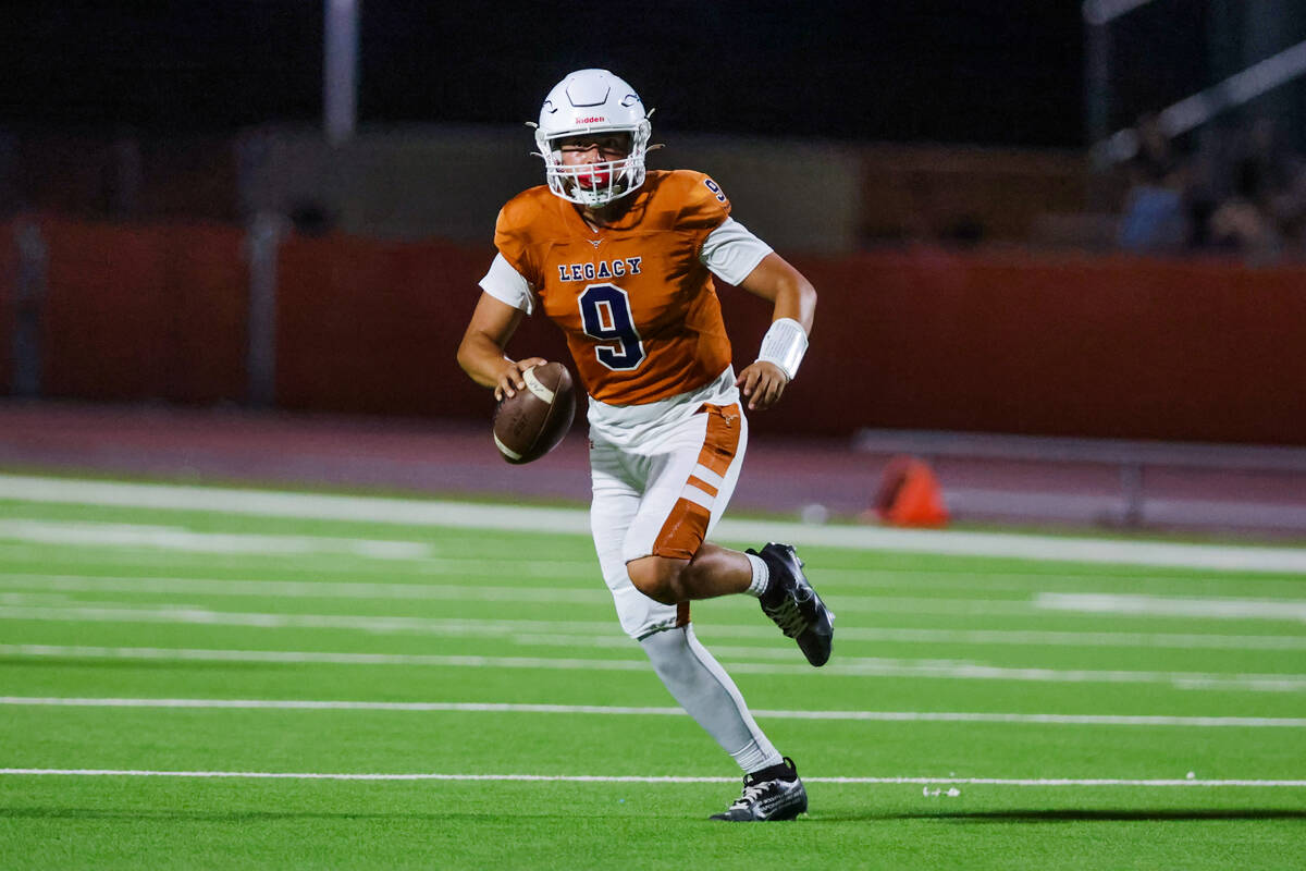 Legacy quarterback Aidan Crawford (9) rolls out of the pocket during a football game between Le ...