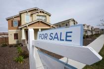 A "for sale" sign is posted in front of a home in Sacramento, Calif., March 3, 2022. (AP Photo/ ...