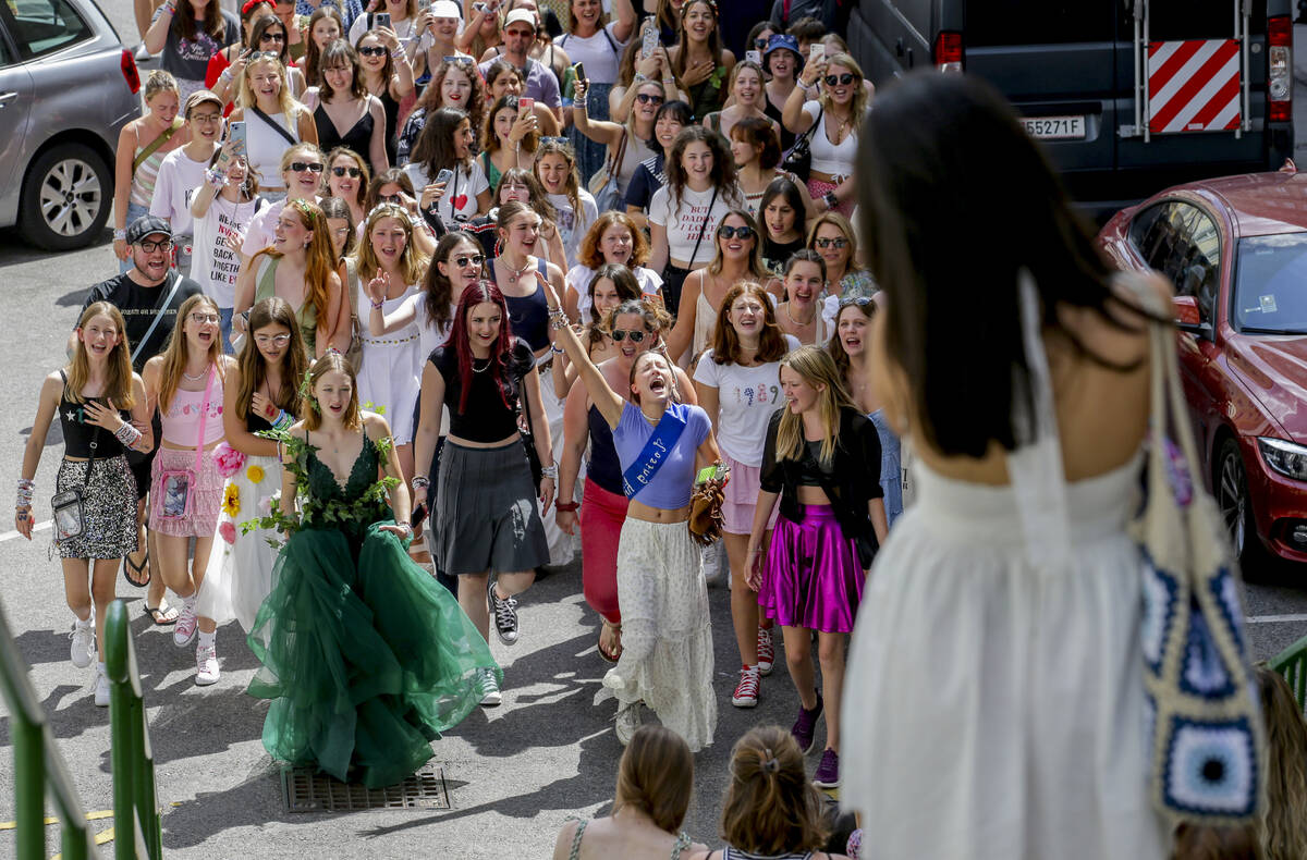 Swifties sing and dance in Vienna on Friday, Aug.9, 2024. Organizers of three Taylor Swift conc ...