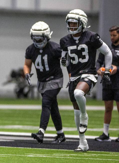 Raiders linebacker Amari Gainer (53) warms up with teammates during practice at the Intermounta ...