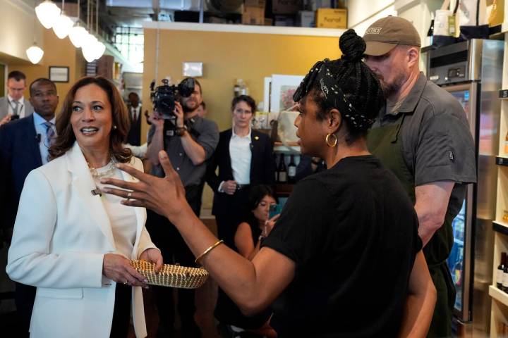 Democratic presidential nominee Vice President Kamala Harris talks during a stop at Dottie's Ma ...