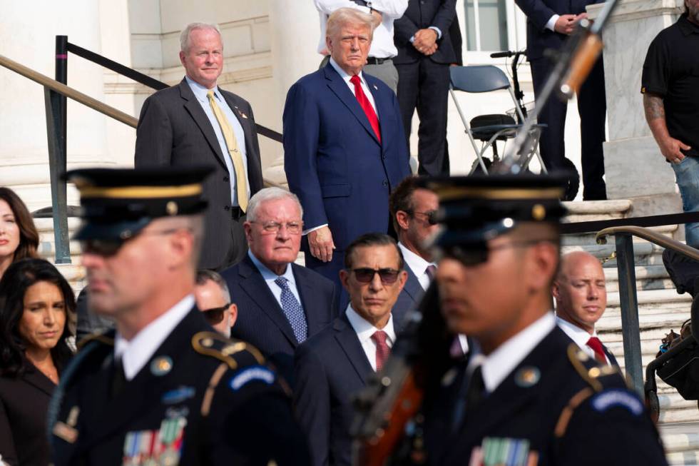 Bob Quackenbush, top left, deputy chief of staff for Arlington National Cemetery, and Republica ...