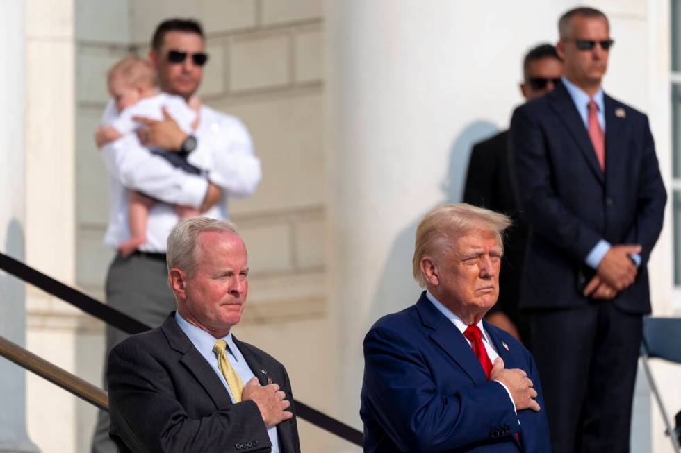 Bob Quackenbush, left, deputy chief of staff for Arlington National Cemetery, and Republican pr ...