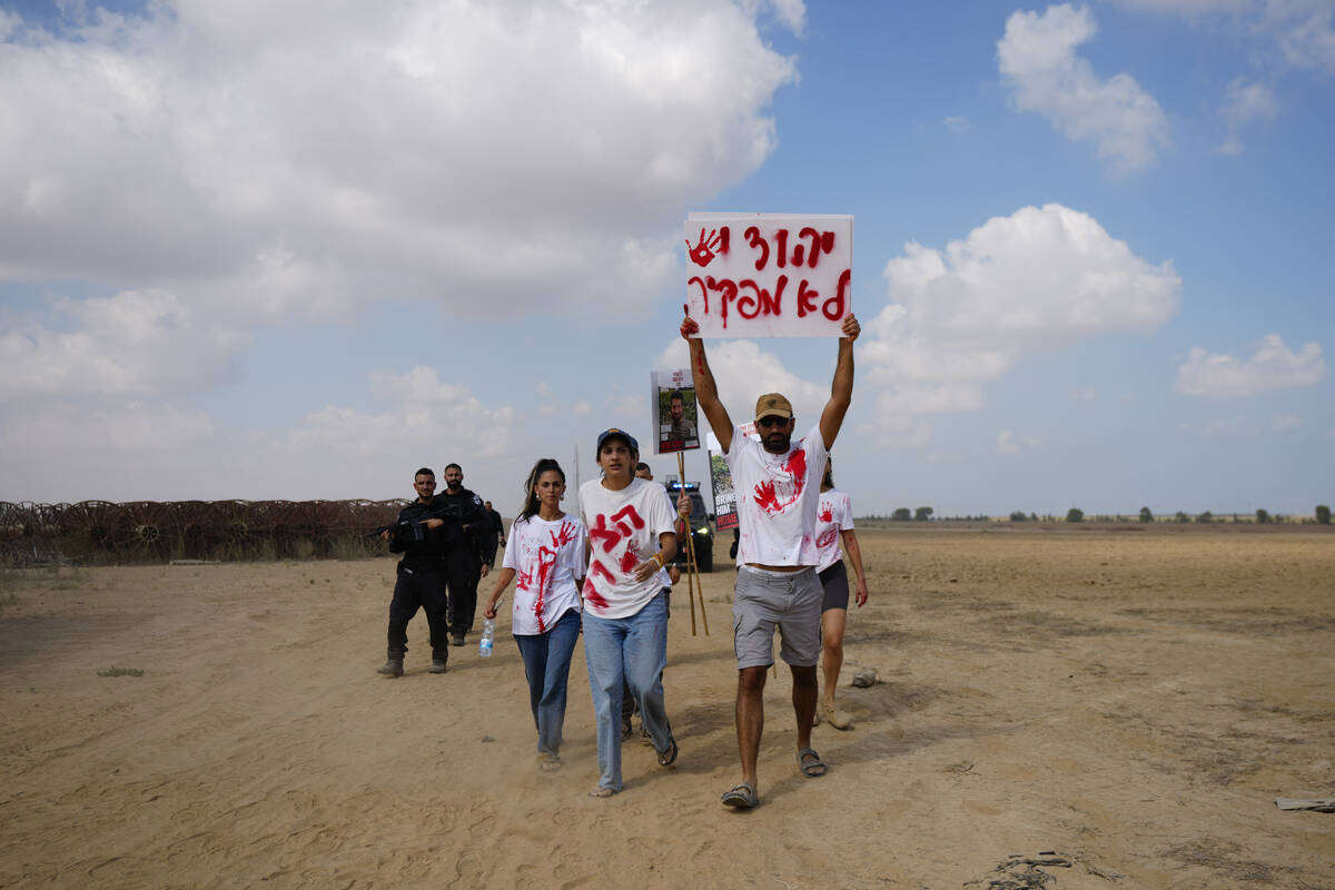 Relatives and friends of hostages held in the Gaza Strip by the Hamas militant group take part ...