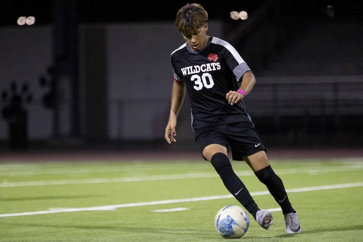 Las Vegas High’s Anthony Cardenas (30) competes during the high school soccer game again ...