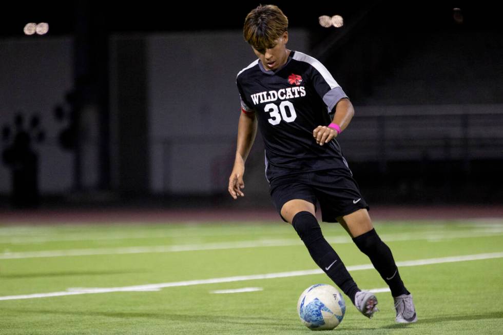 Las Vegas High’s Anthony Cardenas (30) competes during the high school soccer game again ...