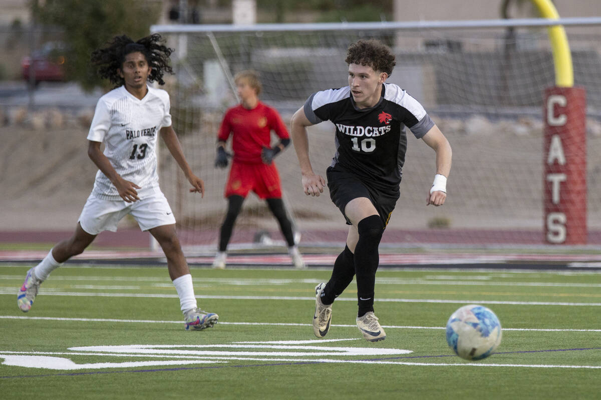 Las Vegas High senior Daniel Murillo (10) competes during the high school soccer game against P ...