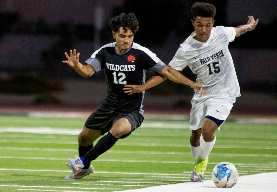 Las Vegas High senior Abraham Trujillo-Hinojosa (12) and Palo Verde senior Trevon Aytch (15) co ...