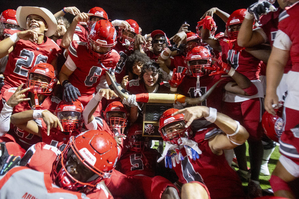 Arbor View celebrates defeating Legacy 49-7 after the Class 5A high school ‘Battle of th ...