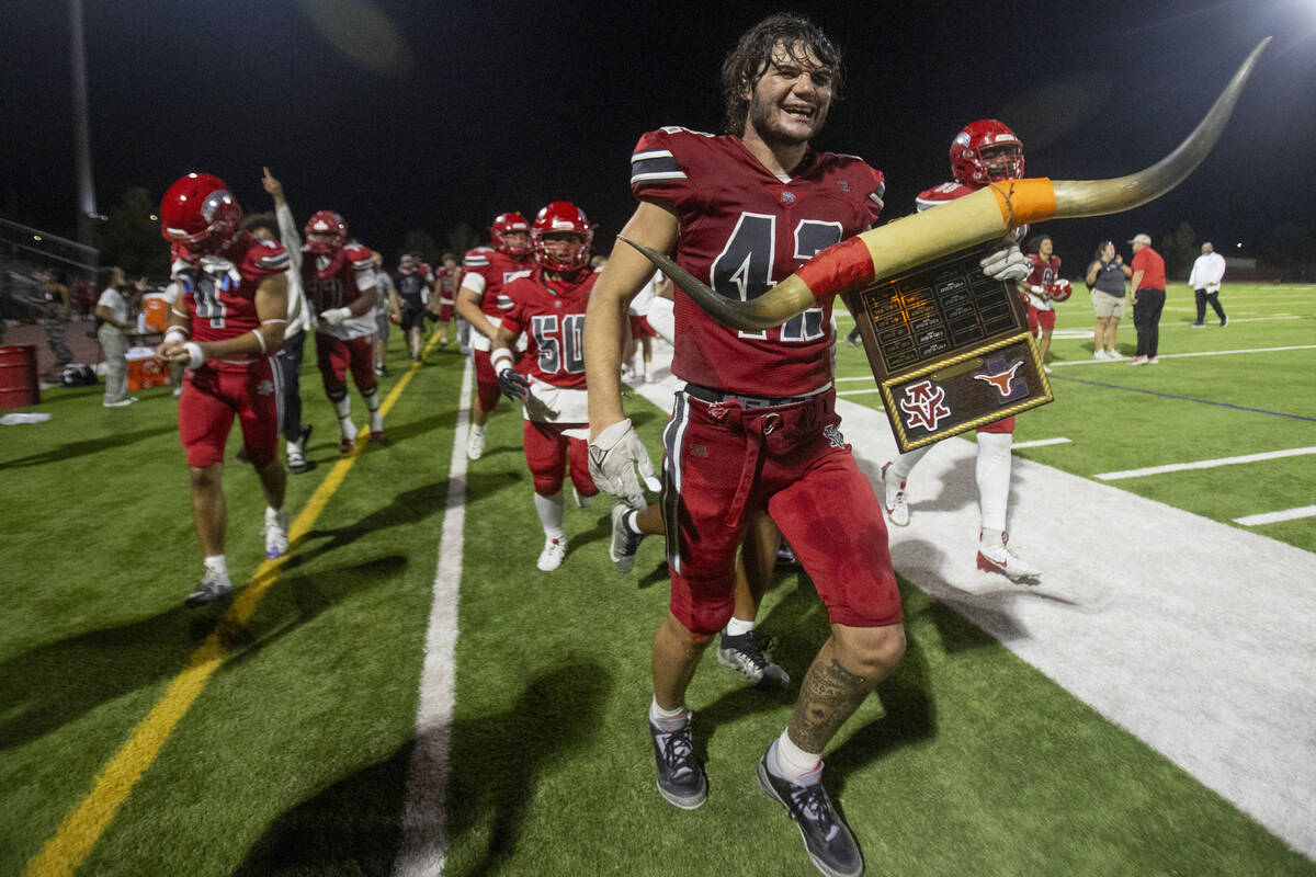 Arbor View linebacker Christian Thatcher (42) runs with the ‘Battle of the Bulls’ ...