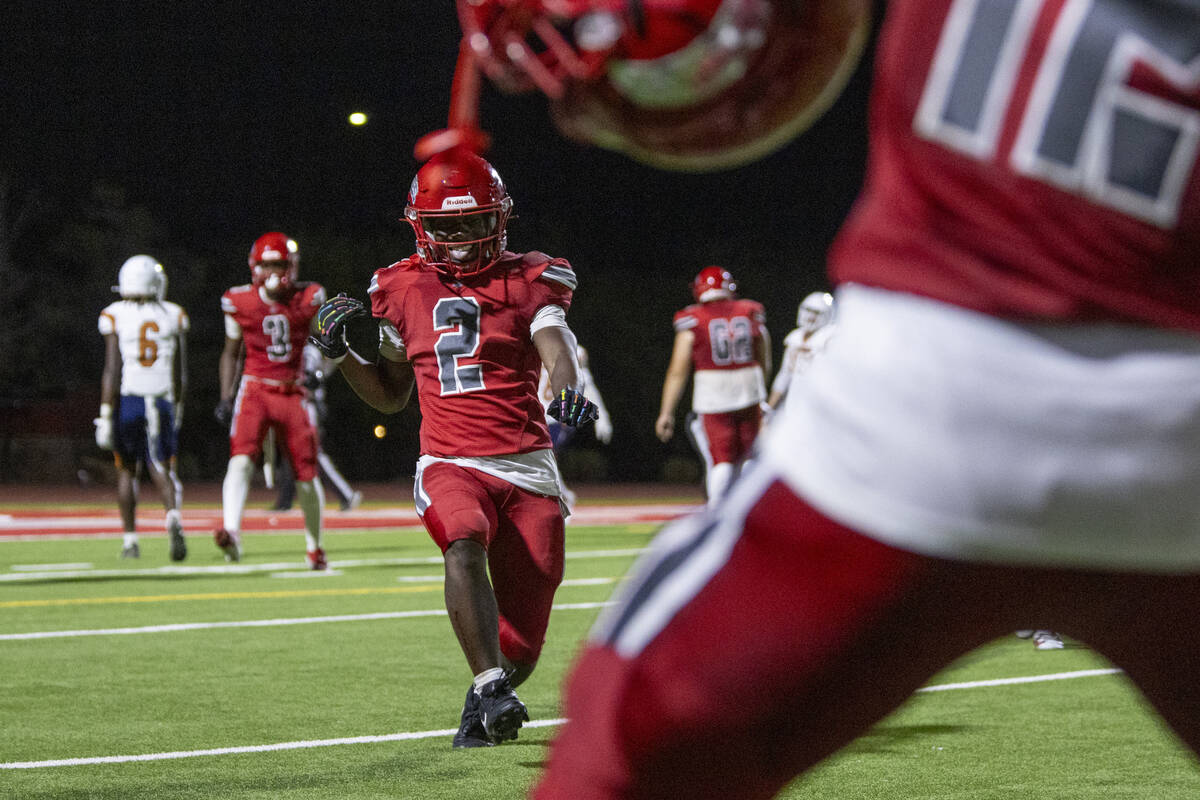 Arbor View running back Sean Moore (2) dances toward the sideline after scoring a touchdown dur ...