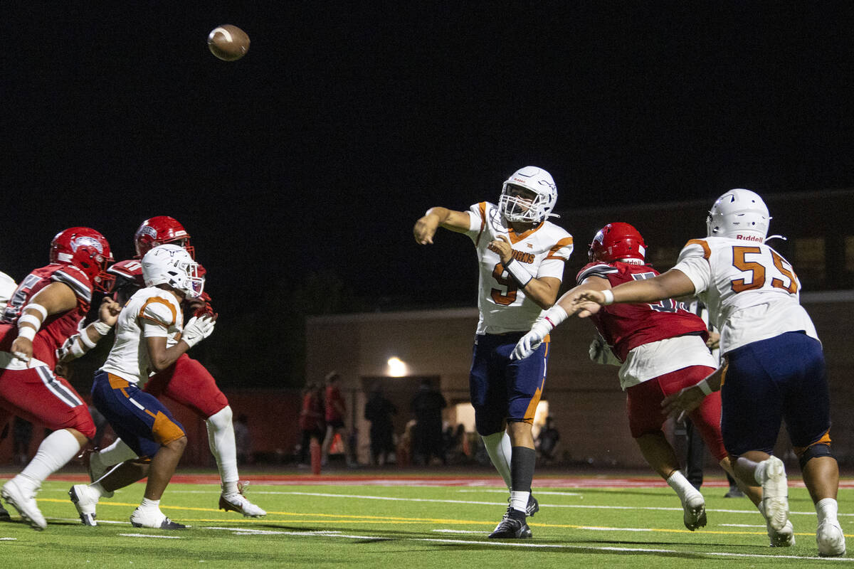 Legacy quarterback Aidan Crawford (9) throws the ball during the Class 5A high school ‘B ...