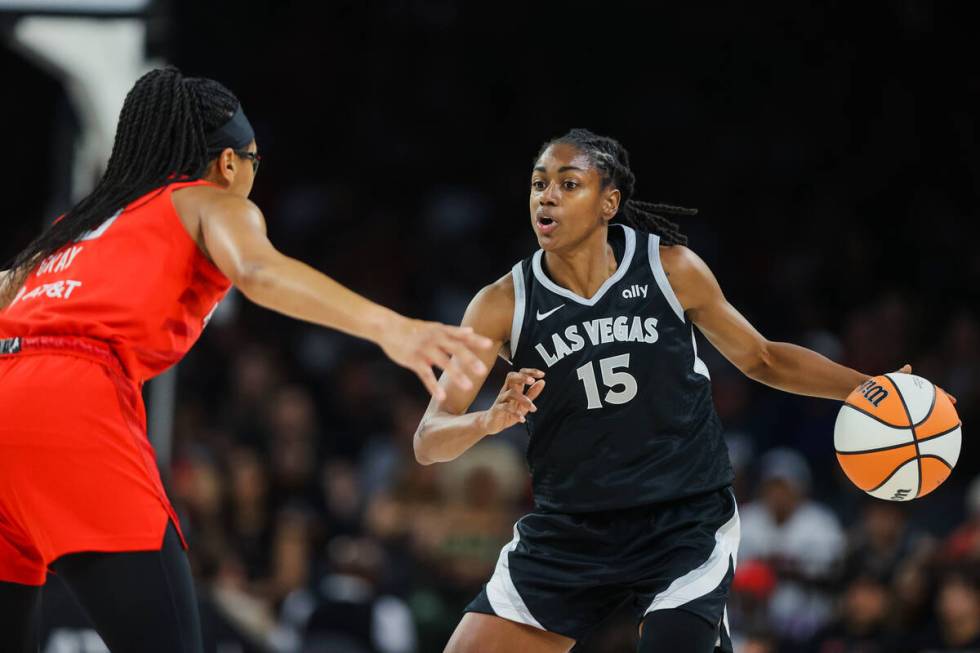 Aces guard Tiffany Hayes (15) dribbles the ball during a WNBA basketball game between the Las V ...