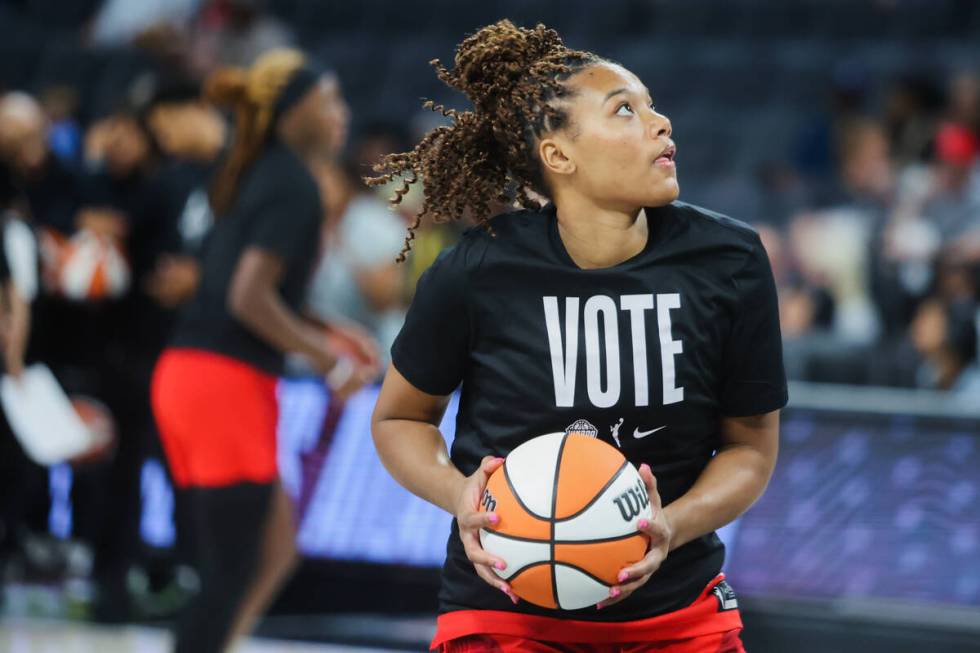 Atlanta Dream forward Naz Hillmon warms up in a “Vote” shirt during a WNBA basket ...