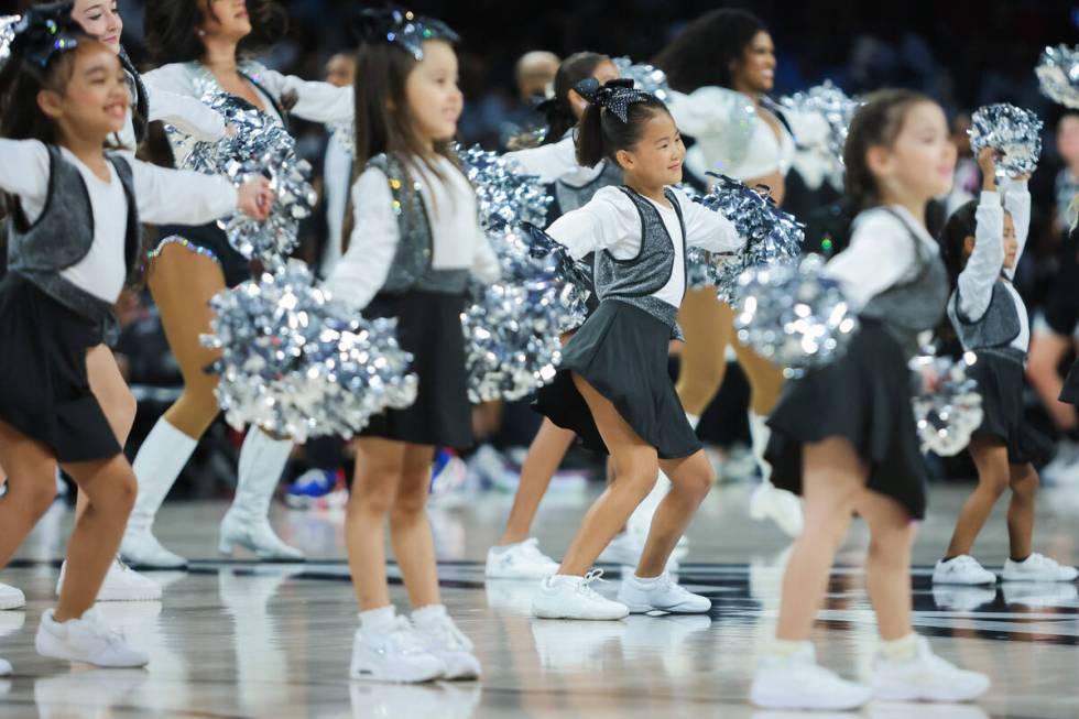 The Junior Raiderettes perform during a WNBA basketball game between the Las Vegas Aces and the ...